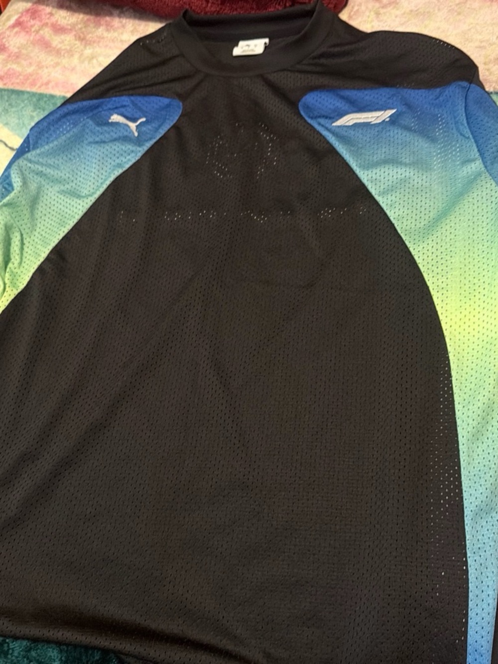 Puma Men’s Black Swim Rash Guard with Blue-Green Gradient Accents